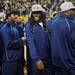 Michigan junior quarterback Denard Robinson smiles as he exits the floor with teammates after the football team was honored during a timeout at Crisler Center on Wedensday. Melanie Maxwell I AnnArbor.com
